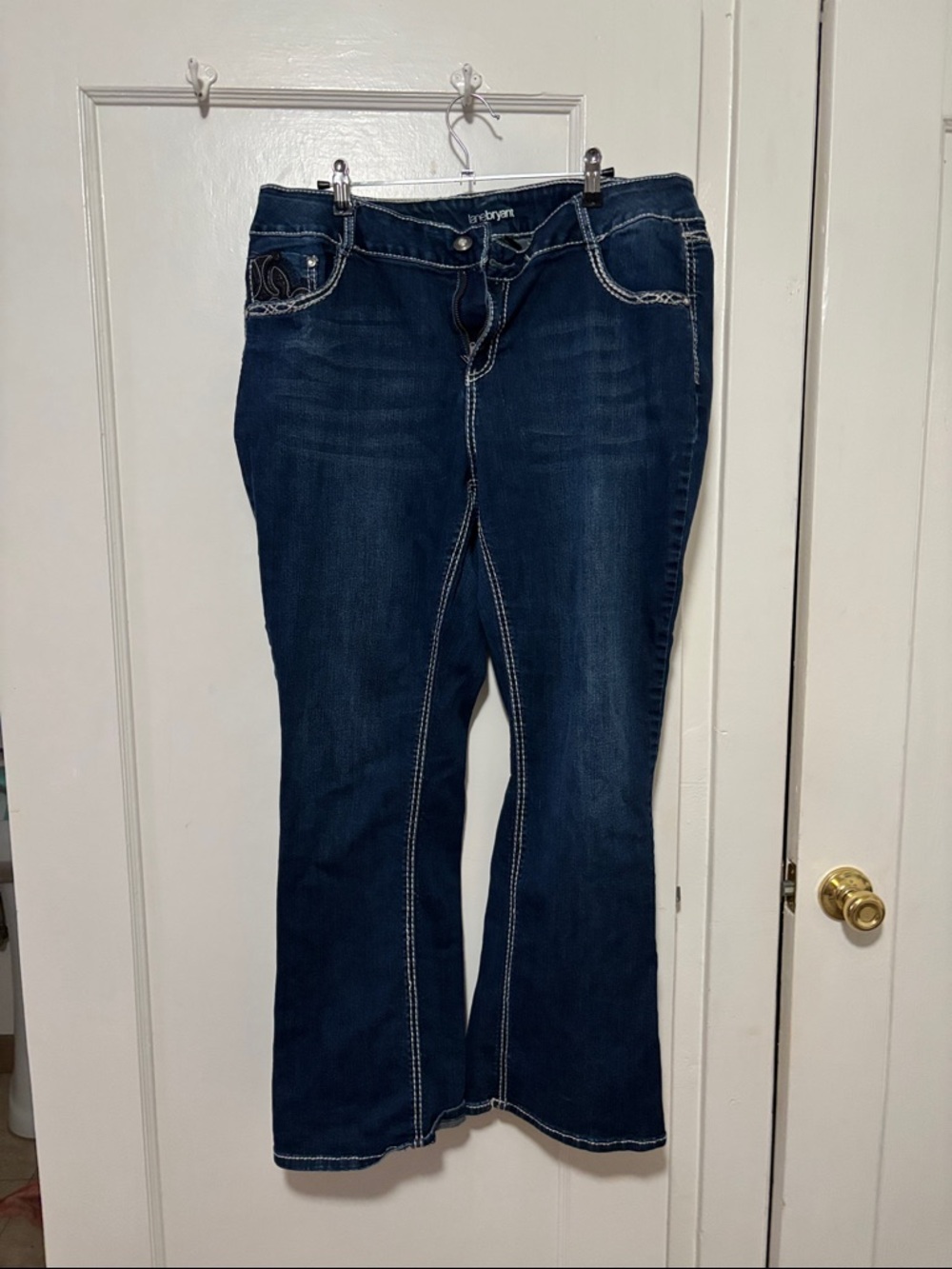 Lane Bryant Women’s Dark Blue Bootcut Jeans with design on back pockets